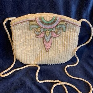 1980’s small beaded purse.  Unknown brand.  Cream with multi-color design.